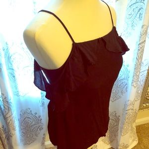 Black off shoulder shirt.